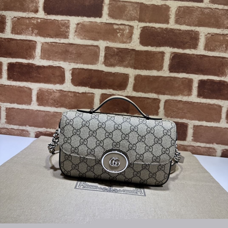 G*u*i top handle bags